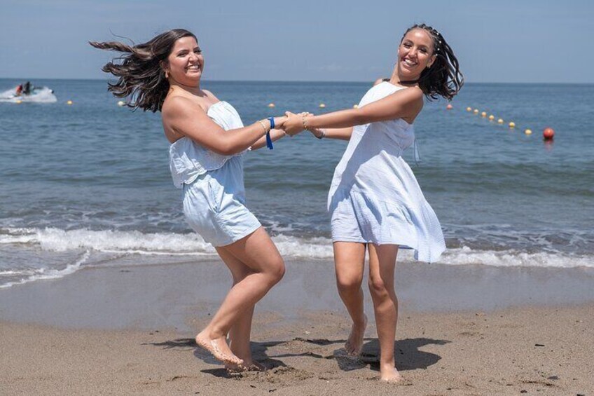 Sisterly Joy in the Ocean Breeze