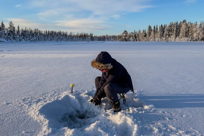 Small Group Ice Fishing Experience in Levi