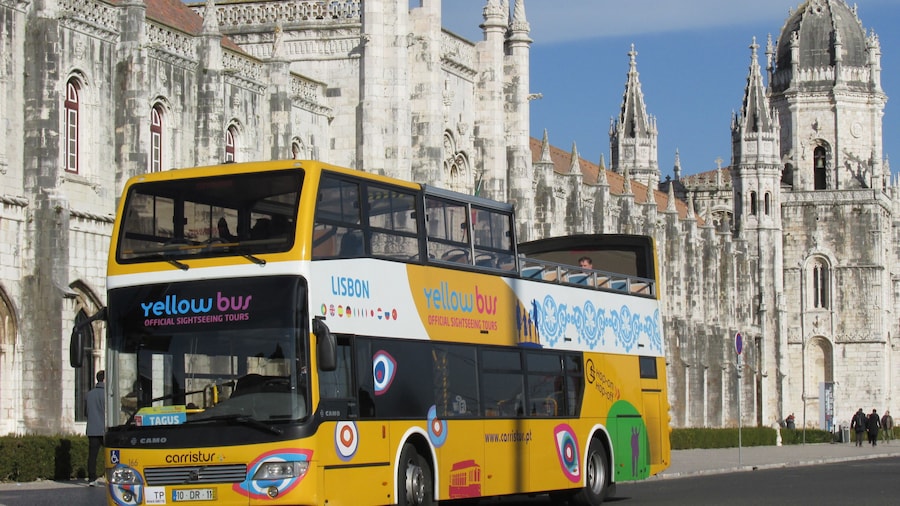 Hop-on hop-off bus in front of the Jerónimos Monastery in Lisbon