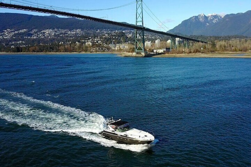 Vancouver sightseeing boat tour. The iconic Lions Gate bridge in the background.