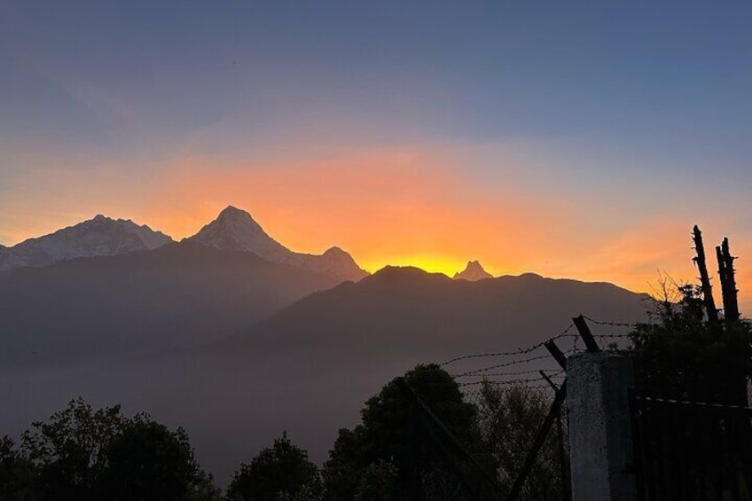 Sunrise over Annapurna South and Mount Fishtail