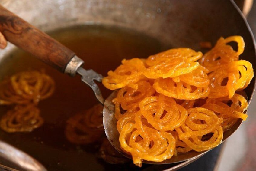 Taste Jalebi (Deep fried spirals of dough served with sugar syrup) at Katra Ahluwalia 