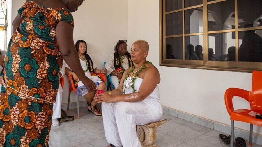 Naming Ceremony Process on Traditional Wooden Stool