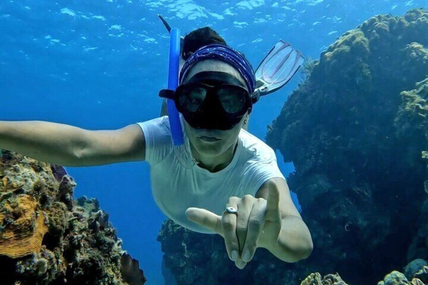 Dive into the vibrant underwater world during your snorkeling adventure at Inah Reef