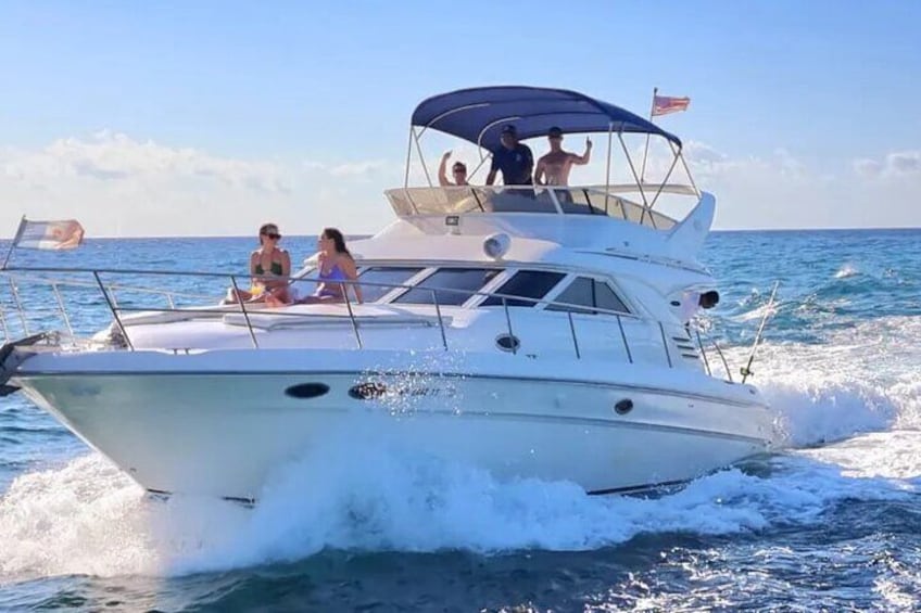 Luxurious yacht cruising through the crystal-clear Caribbean waters