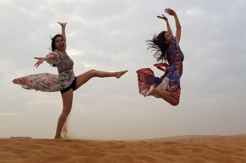 Exclusive Dune Bashing, Camel Ride, Falcon Photo & Sandboarding