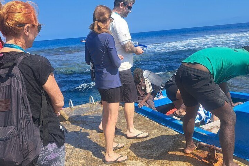 Boarding for blue cave tour