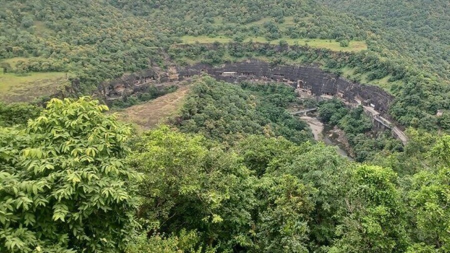 The viewpoint at Ajanta Caves, known as 'U' Point, offers a breathtaking panoramic view of the horseshoe-shaped gorge, with a stunning perspective of the ancient caves nestled in the rocky landscape.