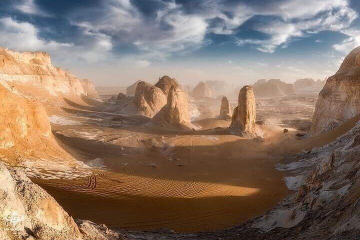 "Where white sands meet the clear skies! #WhiteDesert #UnforgettableAdventures"
