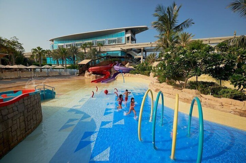 Kids can enjoy endless fun at Aquaventure's splash zones and child-friendly slides, perfect for a family day out.