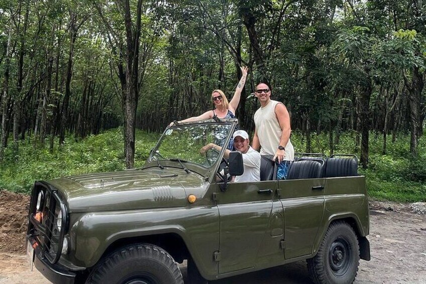 Jeep among the rubber trees