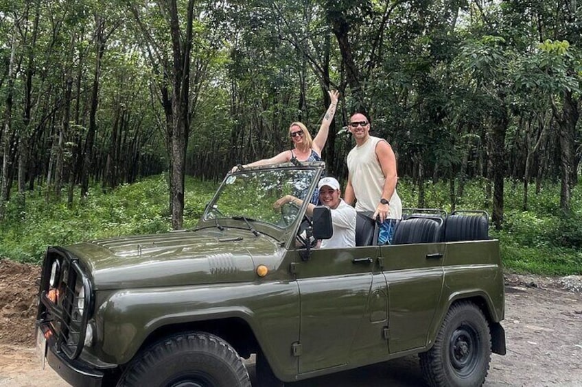 Jeep among the rubber trees