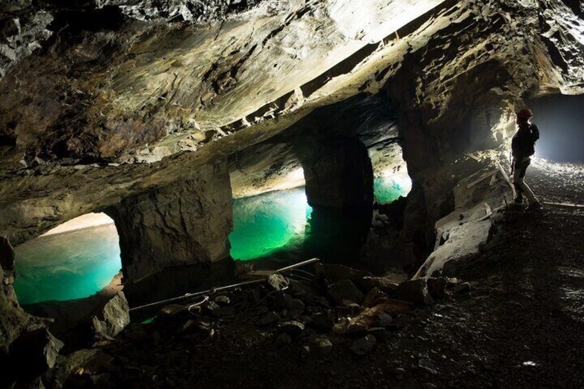 In the mine, there are large underground lakes with crystal-clear water