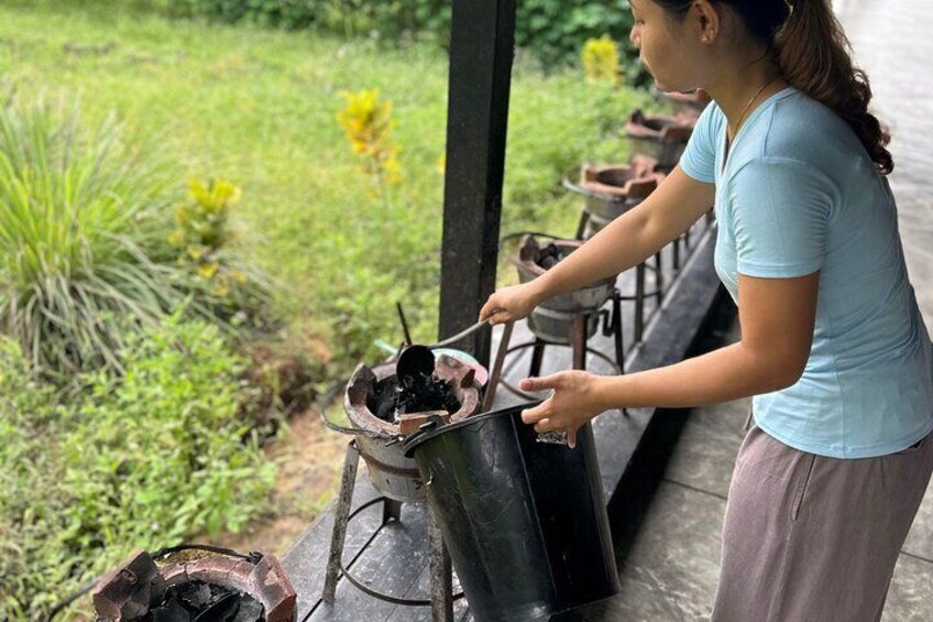 Traditional charcoal cooking stations 