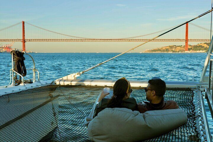 Sunset Experience: Lisbon Boat Cruise with Music and a Drink