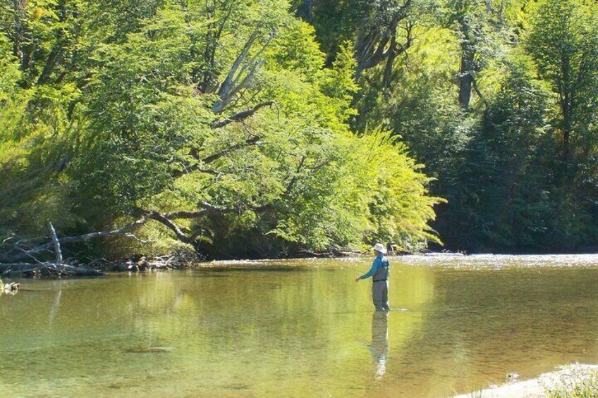 Fishing in the river with fishing suits.