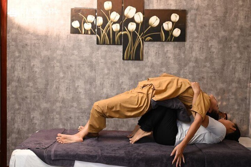 Stretching is an important massage step in Thai massage technique.