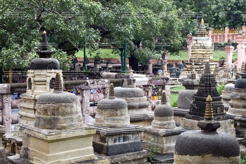 Buddhist stupas isolated with bright sky and unique prospective image is taken at mahabodhi temple bodh gaya bihar india. it is the enlightened place of Grate budha and very religious for buddhist.