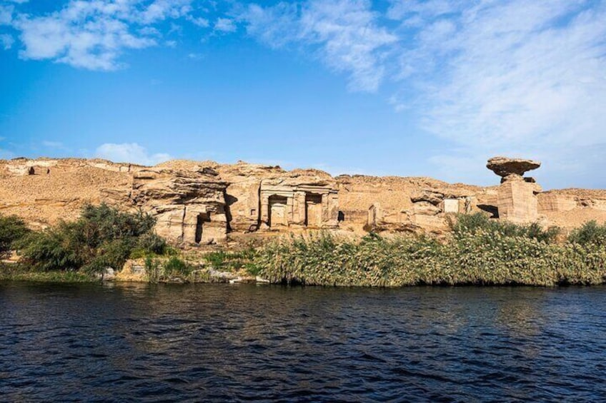 Gebel el-Silsila, a region rich in history and natural beauty, featuring ancient temples, sandstone cliffs, and the Nile River.