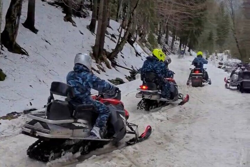 Snowmobiles Rides in the Carpathian with private transport