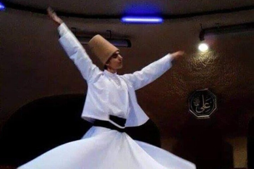 Whirling Dervishes in Historical Cave in Cappadocia