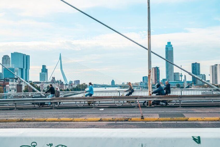 At the Willemsbridge with the Erasmusbridge and Zalmhaventower in the back