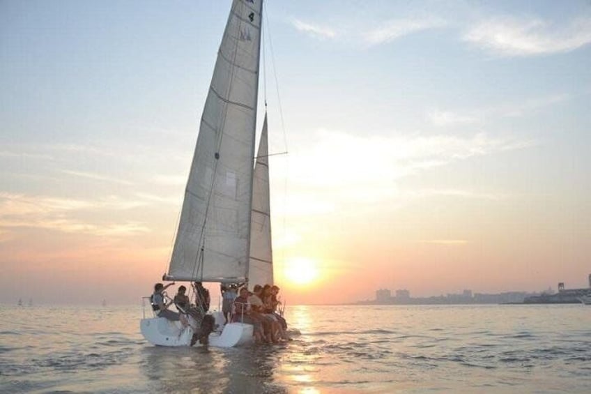 Sunset from Mumbai Harbour over Mumbai skyline