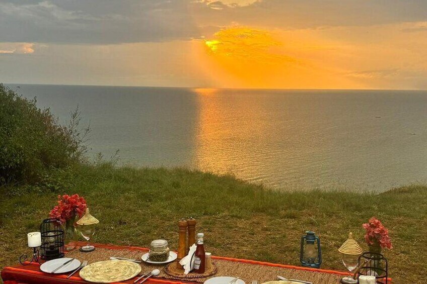 Bush diner with a view of Lake Albert