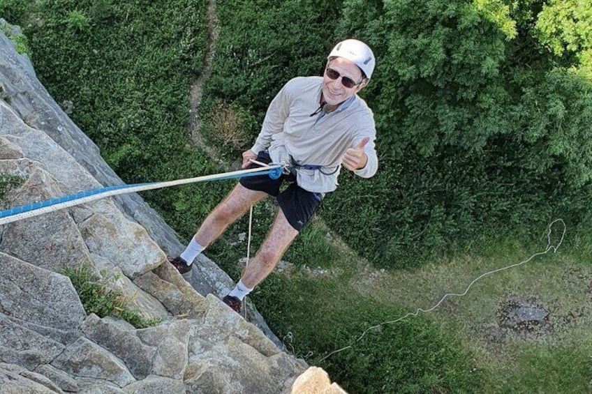 Enjoying the rush of the abseil!