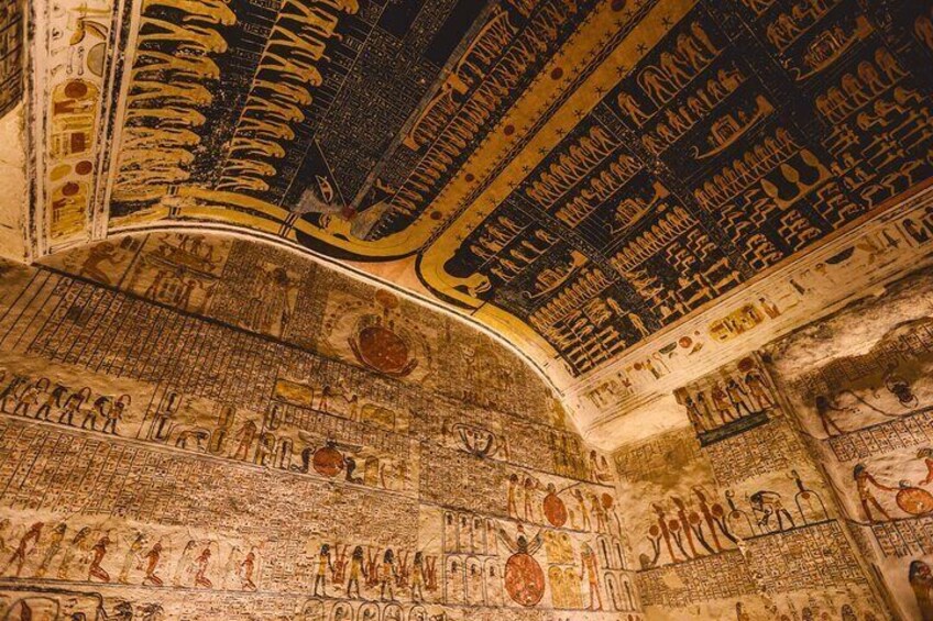 A captivating view of the colourful ceiling in KV9, showcasing its intricate astronomical depictions and vibrant hues.