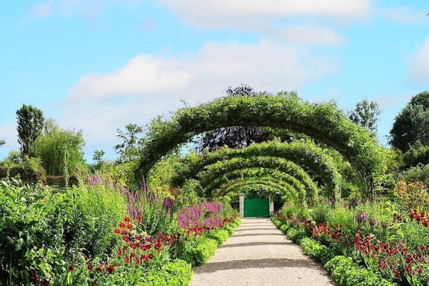 Monet’s vibrant gardens are a feast for the eyes, filled with flowers in every color imaginable.