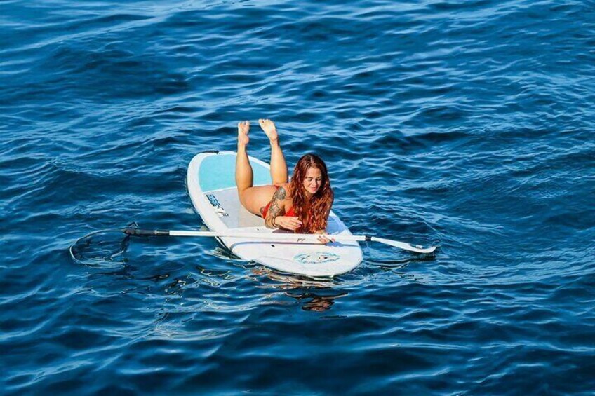 Wide stable paddle boards are included.