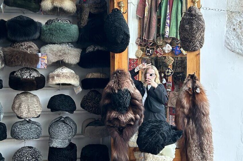 Traditional Uzbek Fur Hats Display – Learn about the history and significance of traditional Uzbek headwear, often worn during special cultural events and celebrations