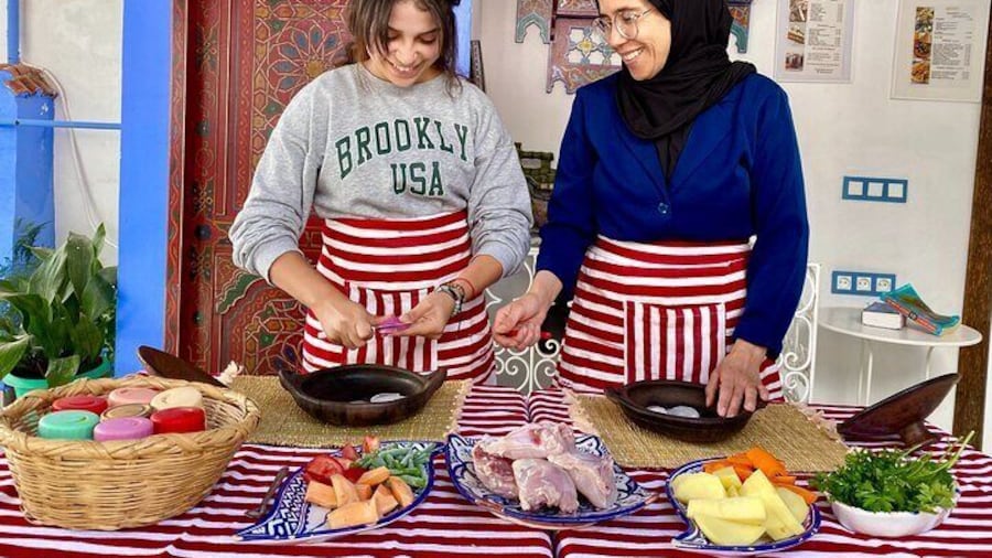 Moroccan Cooking dinner class with local family & market visit