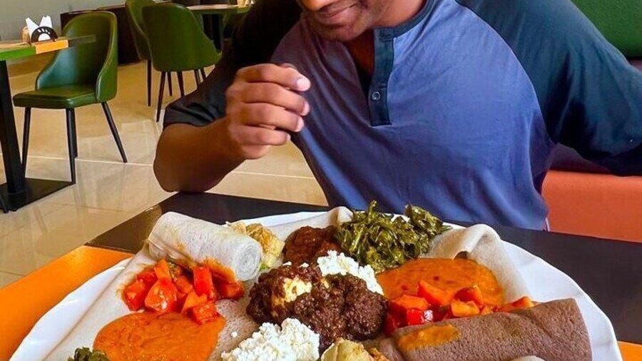 Australian traveler excited to try Injera for the first time!