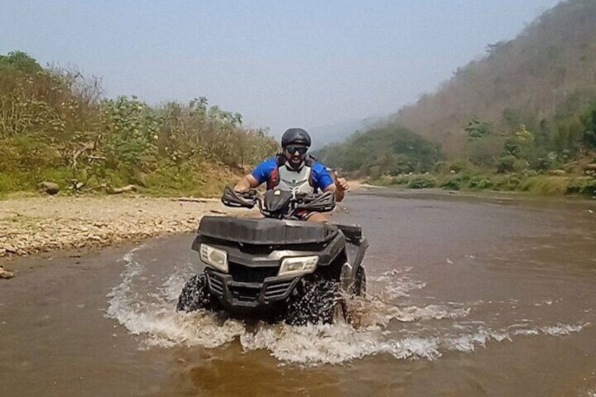 Get ready to experience an adventure with both road and off-road jungle terrain on an ATV tour lasting 1 hour and the captivating Sticky Waterfall!