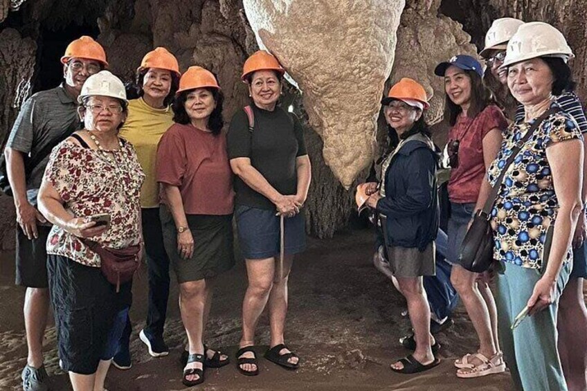 Be captivated by the various stalactites and stalagmites of the cave.