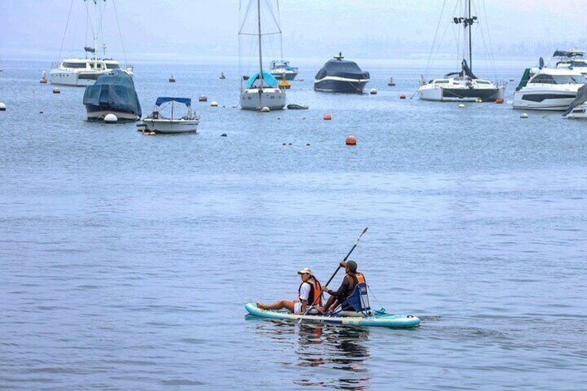 Participant learning the commands of paddleing