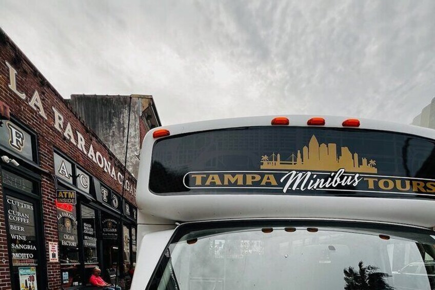 Tampa Minibus guest parked outside of the amazing La Faraona Cigar Factory.