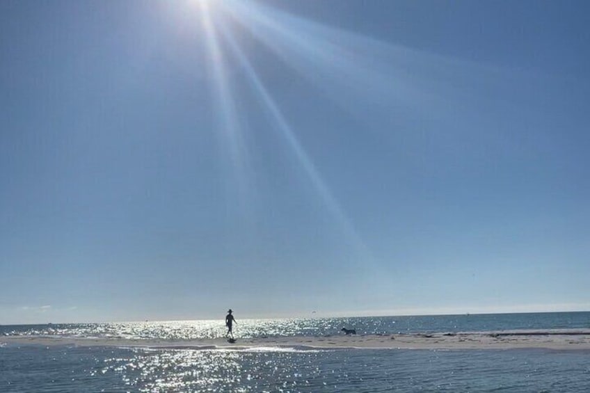 a person standing on the passage key, Florida sandbar