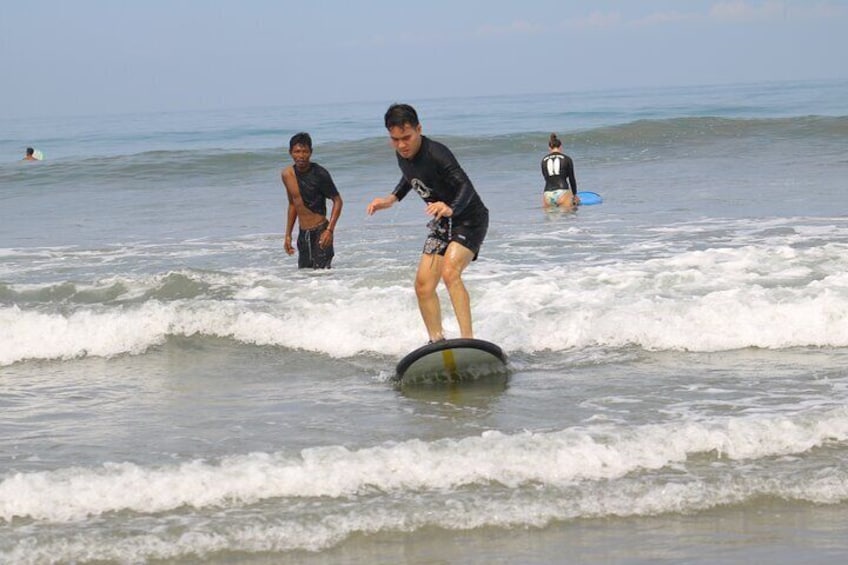Riding first wave and feeling exited. leaning the feet position.