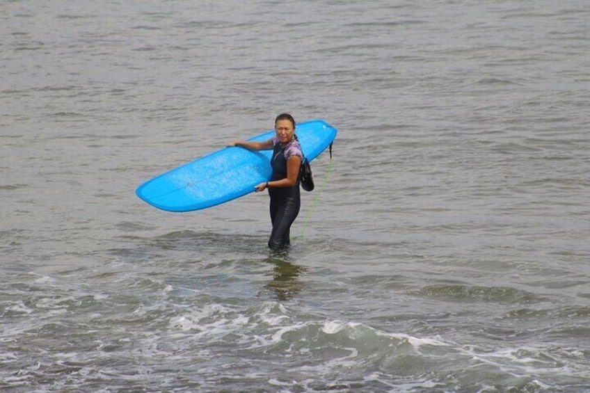 handle how to carry own hard board, from damage before and after surfing.