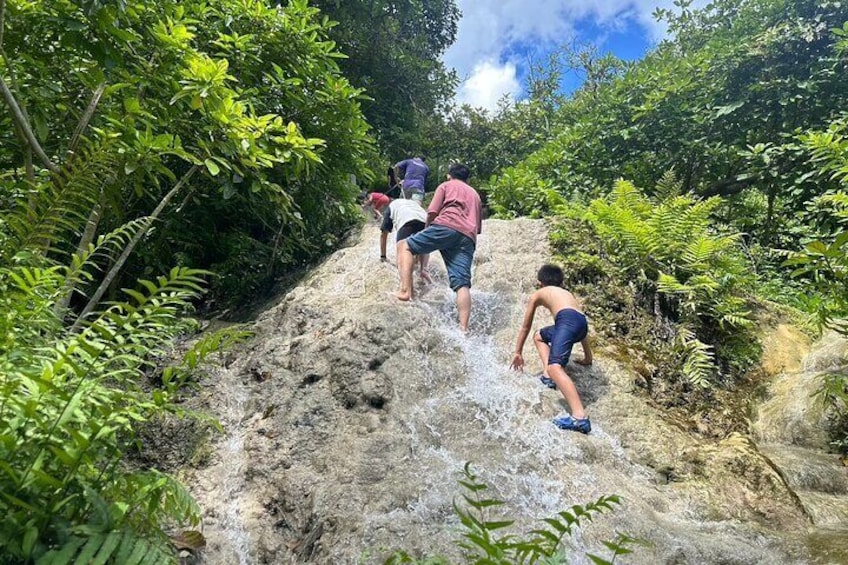 Sticky Waterfall is renowned for its limestone formations that produce a naturally sticky effect, making it a captivating place to visit.