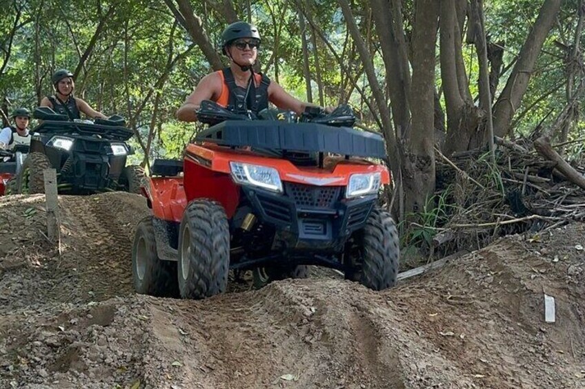 Adventure with the ATV covers a mixture of road and off-road jungle terrain.