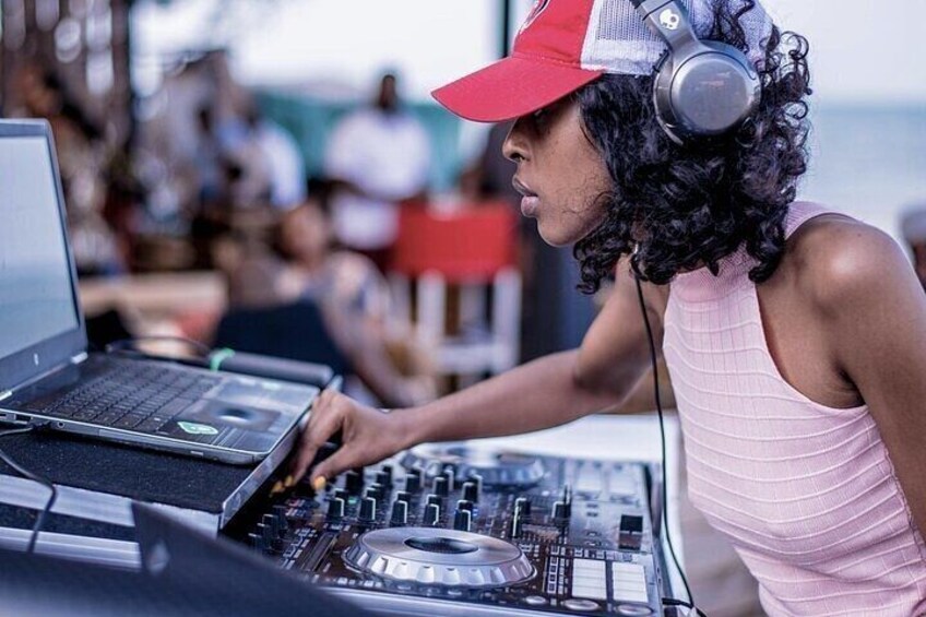 The live DJ energizes the party onboard, creating the perfect atmosphere for an unforgettable night.