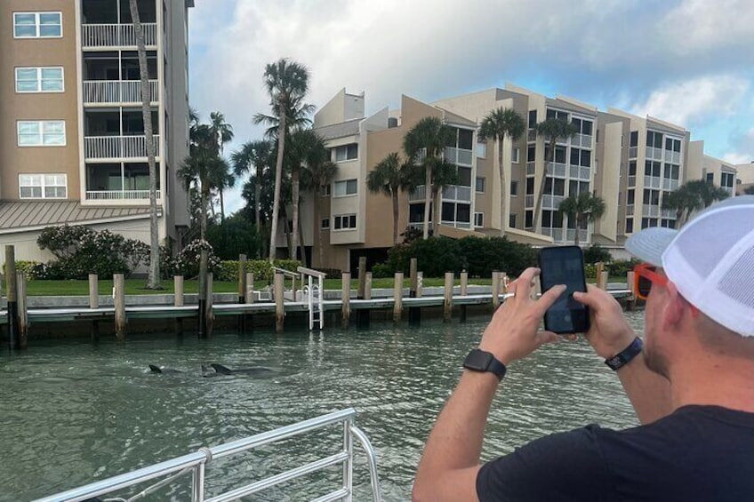 Watch the dolphins as we explore Marco waterfront homes and condos.