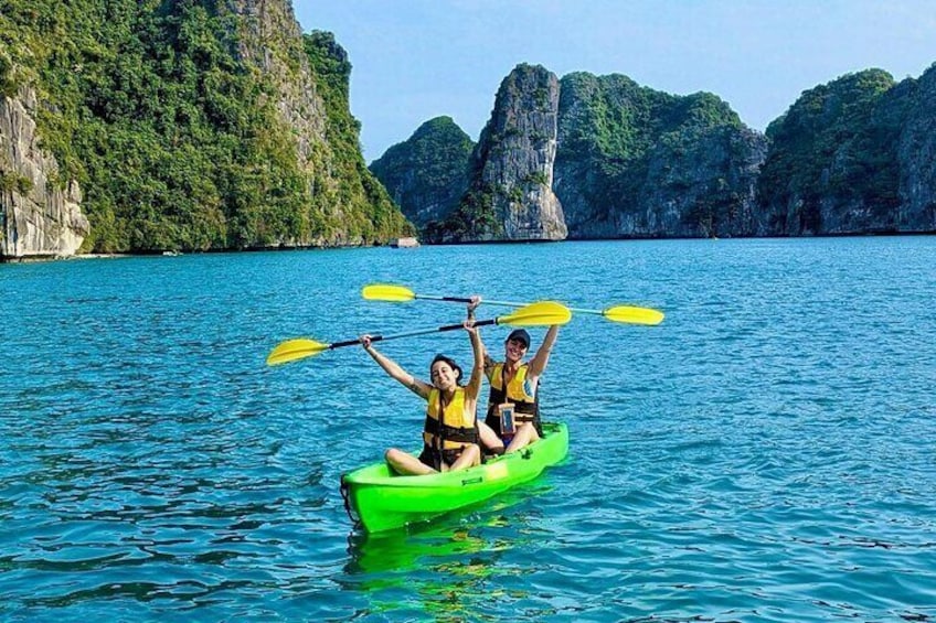 Discover Ha Long Bay's Beauty: Exclusive Canoe Journey from CatBa