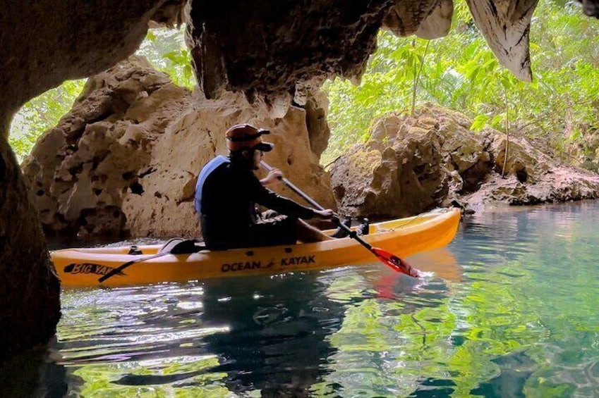 Jungle Bluehole Cave kayak adventure Belize