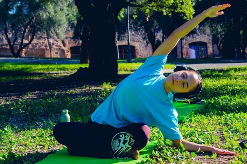 Yoga Class Experience with the View of Colosseum