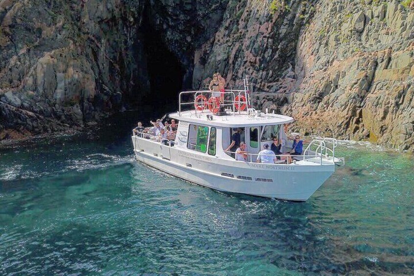 Boat leaving the cave